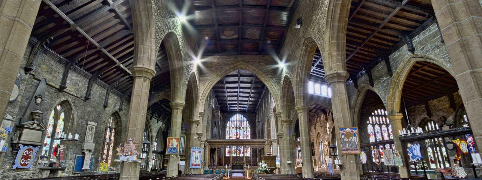 Why is it difficult to heat old churches with fans?